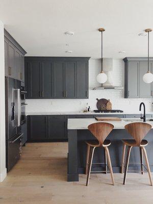 Kitchen designed by Studio H Designs, Inc. with Dura Supreme cabinetry