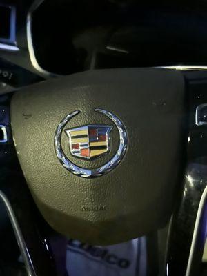 Beautiful Cadillac Symbol on steering wheel.