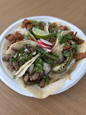 Asada and Al Pastor tacos to go. $3 each, good portions of meat. Delicious!! Wish they had the nachos.