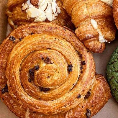 sausage maple croissant, almond croissant, irish cream bun