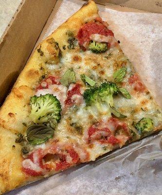 "Corsican" with tomato, broccoli, garlic, romano, mozzarella, basil, and olive oil