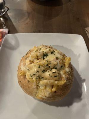 Buffalo chicken Alfredo ziti in a bread bowl.