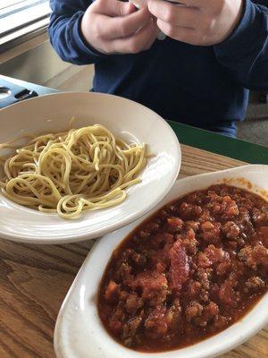 Lunch size spaghetti with meat sauce on the side