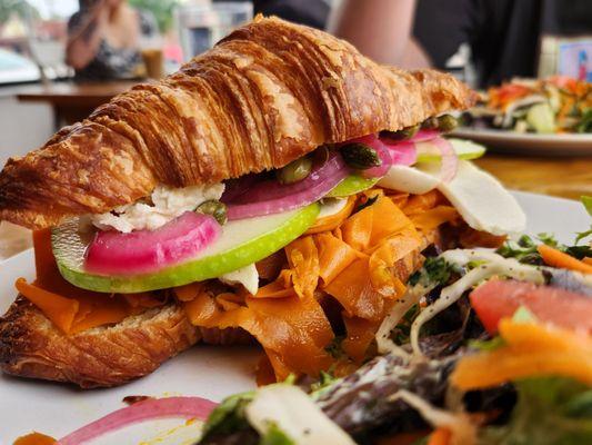 Carrot lox and apple croissant sandwich