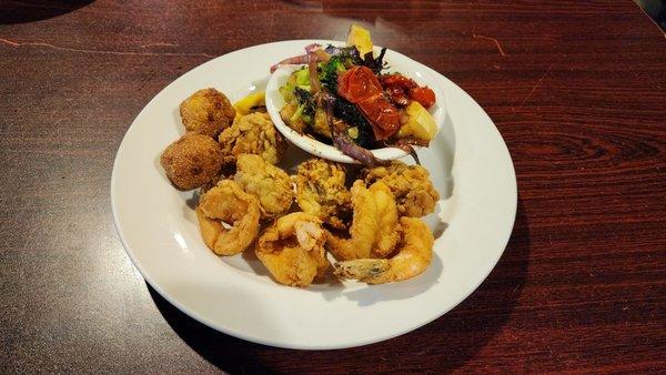 Lunch Small Fried Shrimp & Oyster Combo with Hushpuppies & Vegetables. Includes the salad bar that adds a lot more food to the equation.