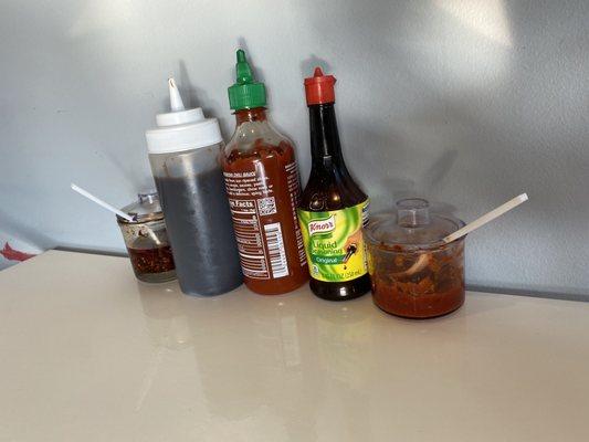 Table sauces - sate, hoisin, sriracha, soy?, and garlic chili paste