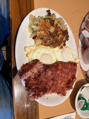 Corned beef hash and basted(they don't poach) eggs.