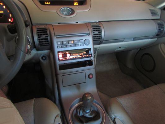 Alpine head unit in customized Metra dash kit.