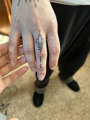 Hand tattoo by Raven