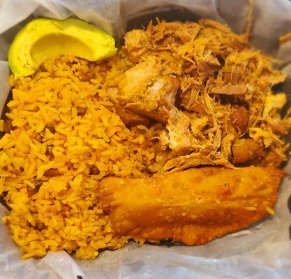 Puerto Rico plate- roasted pork, Spanish rice and beans, avocado and beef empanada.  Perfectly seasoned and mouthwatering tender pork!