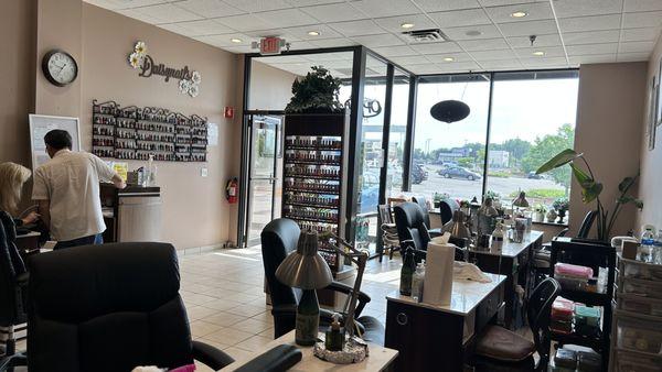 Our front reception desk check in area and manicure stations