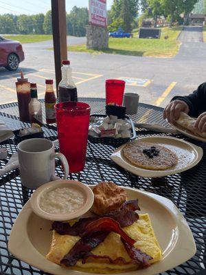 Served breakfast outdoors-  omelet with side of blueberry pancakes