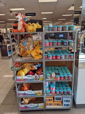 Disney plushies and snacks in jars