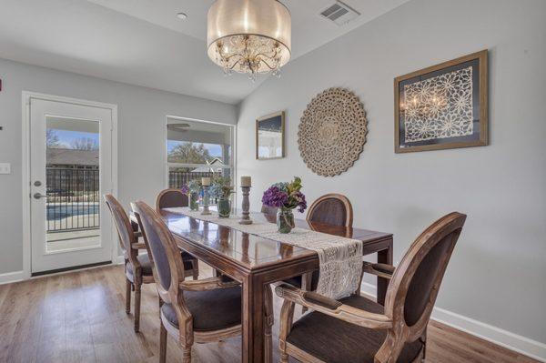 Family-Style Dining - One of our expandable dining tables, made from choice burled wood.