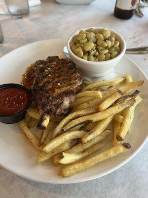 Pork chop, butter beans and fries