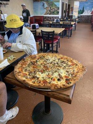 A comparison to see how big the pizza is!!