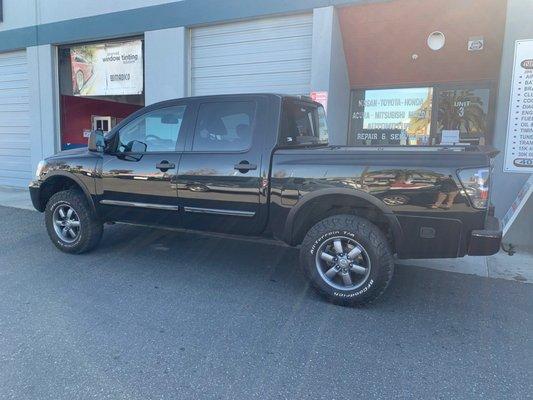 A&J Nissan Specialist and 2014 Nissan Titan.