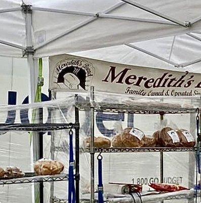 Go to the Meredith's Bread Stand. See you there 12/02/23