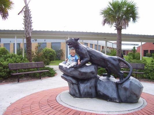 Quincey with panther statue