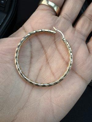 Gold hoop earring marked 14 karat gold, but it was only 10 karat. Clasp was the only 14K.