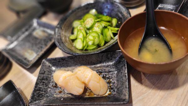 Scallop nigiri, miso soup and cucumber salad