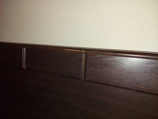 Scratch on headboard.