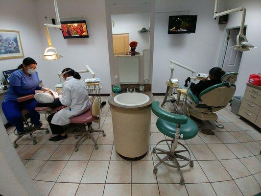 Parents getting their dental exam