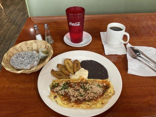 Omelette, plantains, retried black beans , Central American sour cream.