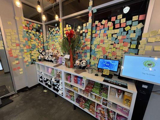 Ordering kiosks and sticky note wall