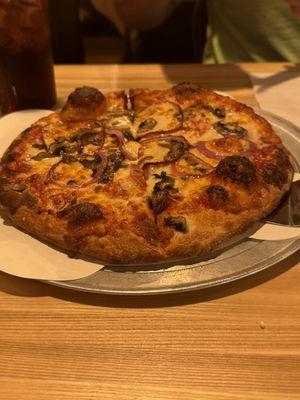 Traditional pizza with mushrooms and onions