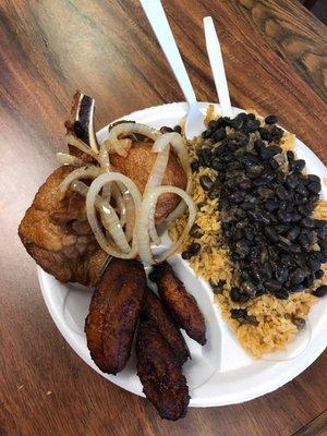 Rice beans and pork chops Rice beans and bistec (steak) and  $29.00So good so worth it !!! Support this business !!!