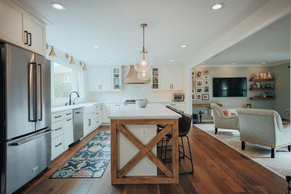 Farmhouse style kitchen remodel in Great Falls, VA with a signature kitchen island