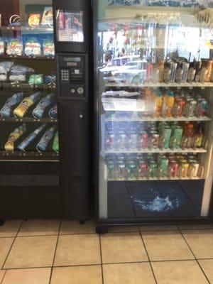 Vending machines for drinks, snacks, and laundry supplies.