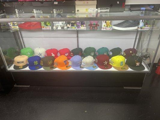 Some of our New Era hat collection. Extremely limited are rare hats.