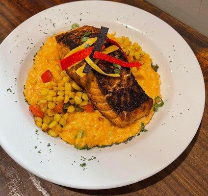 Mexicali Pan seared Salmon over Mexican corn and Parmasen salsa risotto