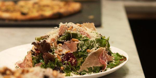 Punch Salad: Mixed greens, pine nut, parmesan, prosciutto in a balsamic vinaigrette