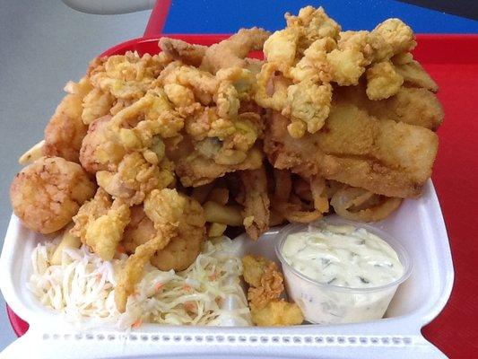 Anyone want to share?  Fish combo with fresh clams, scallops, haddock, and shrimp.  Plus fries, home made onion rings and cole slaw.