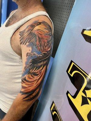 Covered up an old tattoo Paul had with this awesome Phoenix tattoo!