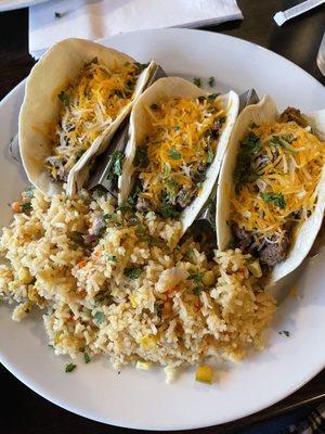 Ground beef tacos with rice (I asked for no lettuce/tomato- which is why there is none!)