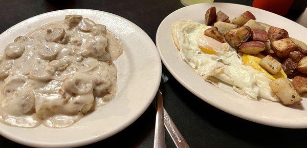 Biscuits with sausage gravy, eggs over easy, home fries