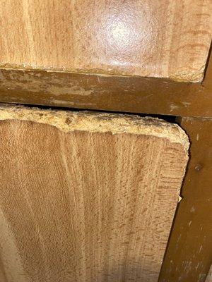 Busted cabinet doors with water damage