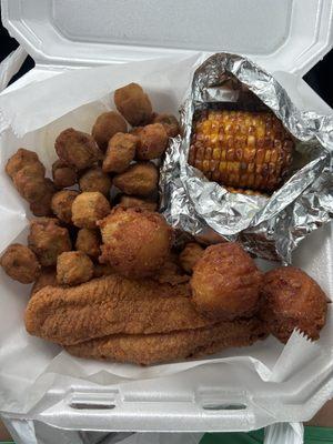 Fried catfish, okra, corn and hush puppies