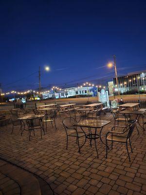 Outside in front of the house, one finds a patio seating area, ideally to be used in the Summer with good weather.