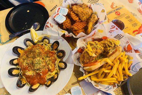 Seafood marinara, catfish with sweet potato fries and catfish po boy