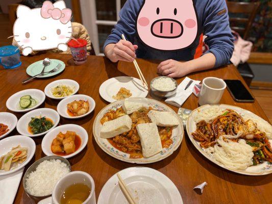 Fried pork belly with tofu and kimchi, spicy squid with vegetables with noodle added