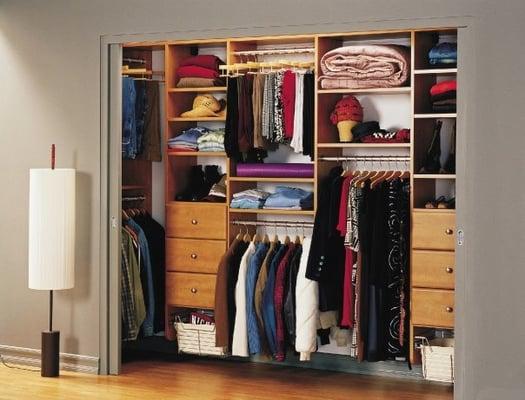 Reach in Closet in Rustik cherry features double hanging for optimal storage, drawers & room beneath the unit for extra storage