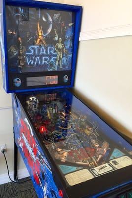 Tucked away in a corner of the pediatric side of the waiting room.  "The force is strong with this one."  Free play.