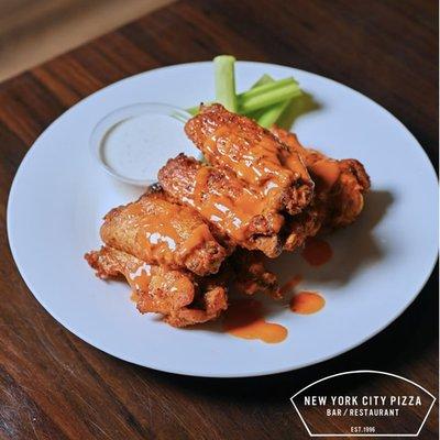 Buffalo wings in plain, mild, hot, garlic parmesan, calypso or Jack Daniels BBQ sauce