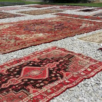 We Hand Wash Antique Rugs!