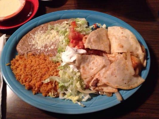 Shrimp fajita quesadilla with rice and beans